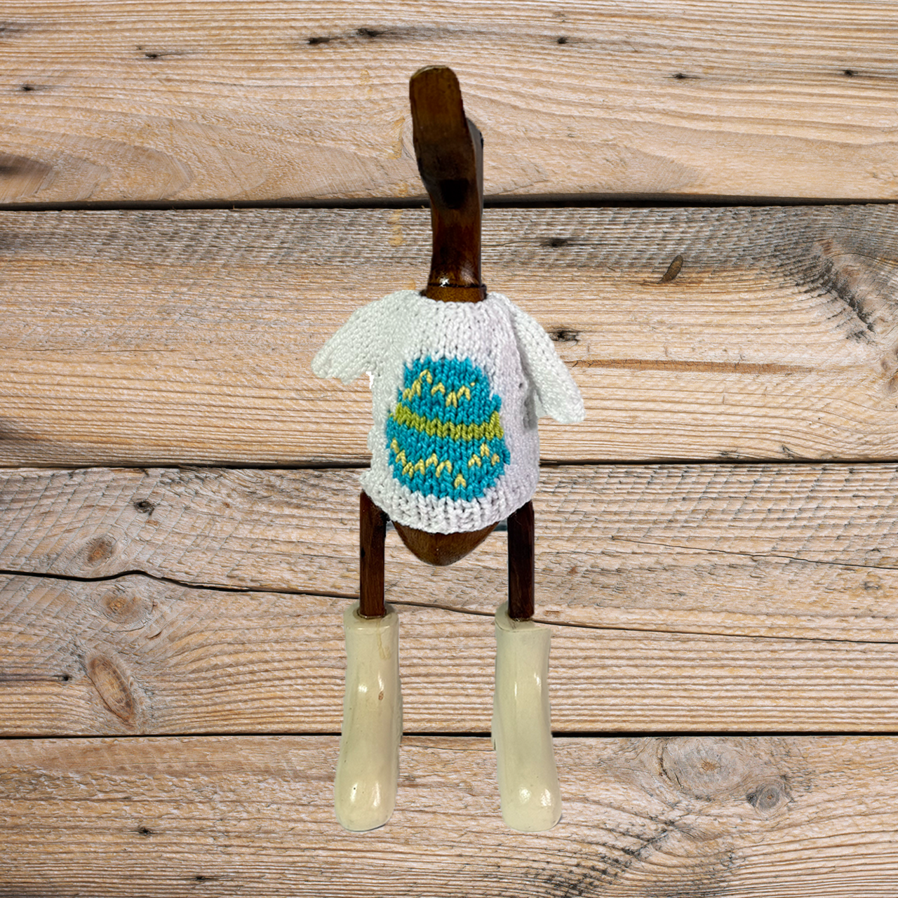 Set of two hand-knit Easter eggs with duck sweater patterns, made by COLLAB BY AMERICAN/HOLIDAY™.
